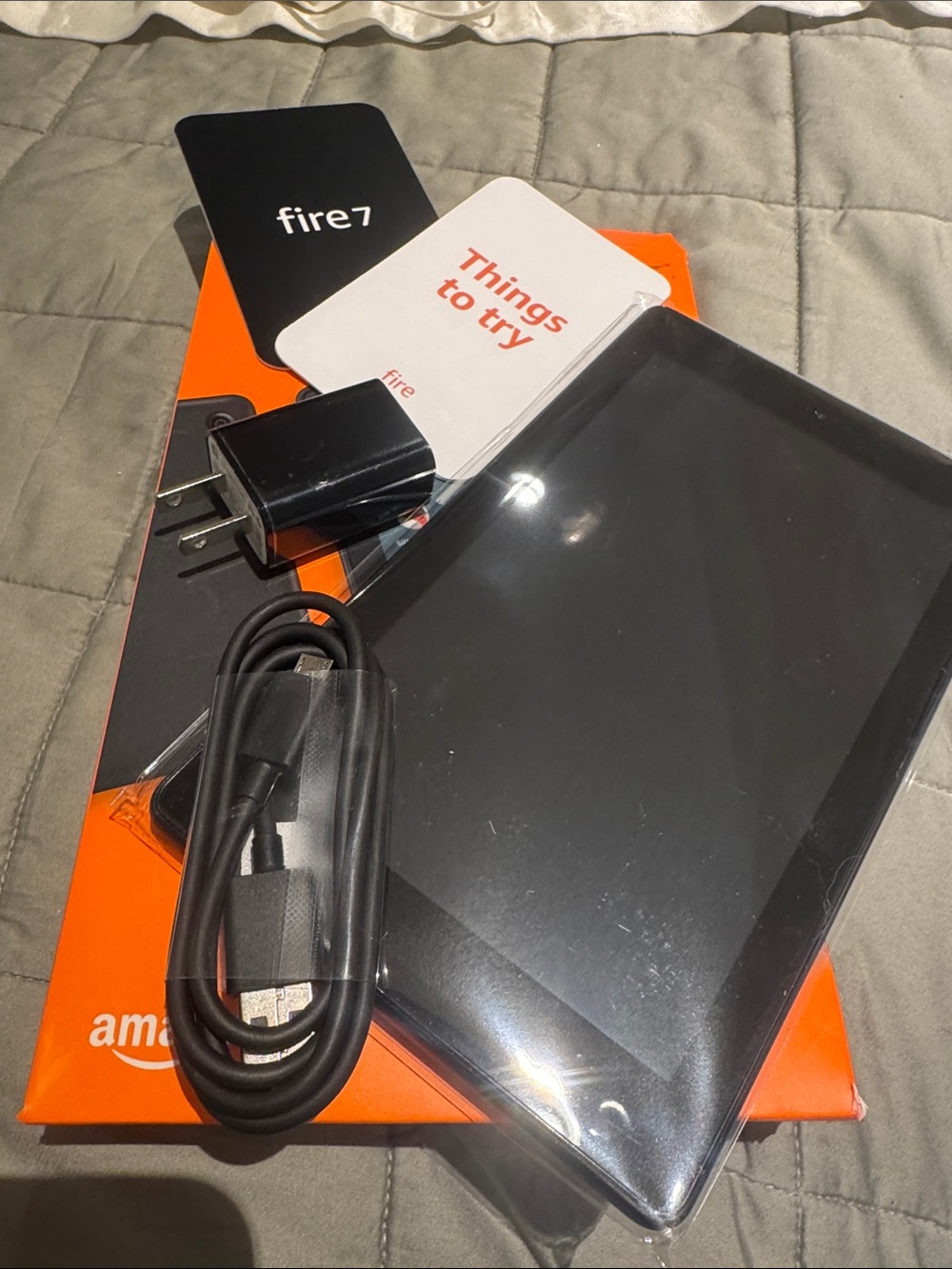 Amazon brand new Fire 7 Tablet with Black Accessories